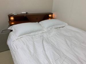 Postel nebo postele na pokoji v ubytování 风宿之所民宿