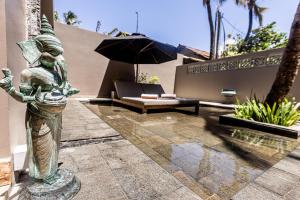 Κήπος έξω από το BK Beach Boutique Hotel - Hikkaduwa