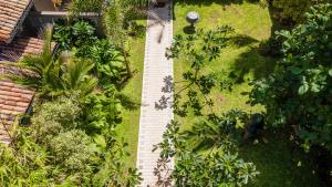 Κήπος έξω από το BK Beach Boutique Hotel - Hikkaduwa