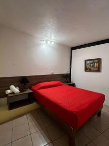 Postel nebo postele na pokoji v ubytování Hotel Quinta Luna Zacatlán