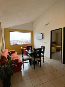 TV a/nebo společenská místnost v ubytování Hotel Quinta Luna Zacatlán + 15 fotografií