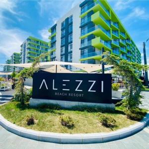 a sign for a beach resort in front of a building at Black Sea View Studio & Spa & Pools Mamaia Nord in Mamaia Nord