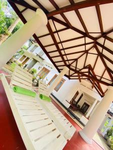 a view from the roof of a house with stairs at Villa bodhi Ahangama, Home stay in Ahangama