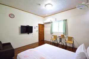 Телевізор і / або розважальний центр в Chin Shan B&B