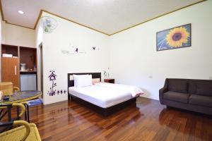 Ліжко або ліжка в номері Chin Shan B&B