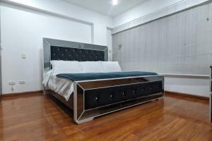 Säng eller sängar i ett rum på APARTAMENTO EN CHICO RESERVADO, PARQUE 93, ZONA T!