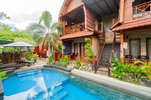 Bazén v ubytování Putra Bali Villa by Bukit Vista nebo v jeho okolí