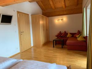 Postel nebo postele na pokoji v ubytování Penthouse Kurz