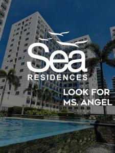 a building with a sign that reads sea residence look for ms angel at Sea Residences - Angel Alano in Manila