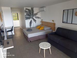 Istumisnurk majutusasutuses Nouveau Domaine de Mabouya vue mer et proximité plage