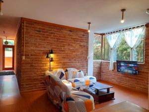 TV a/nebo společenská místnost v ubytování SIERRA VERDE-casa vacacional