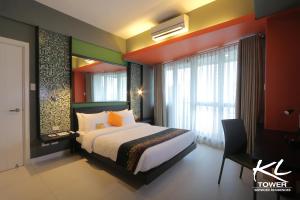 Afbeelding uit fotogalerij van KL Serviced Residences Managed by HII in Manilla