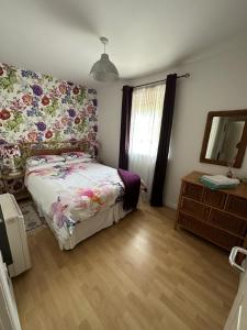 Ένα ή περισσότερα κρεβάτια σε δωμάτιο στο Coleraine Riverside apartment