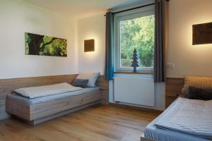 Un pat sau paturi într-o cameră la Nest Heiminghausen