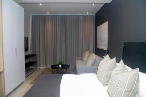 Posezení v ubytování Zimbali Lakes Boulevard Suites 221 + 12 fotografií