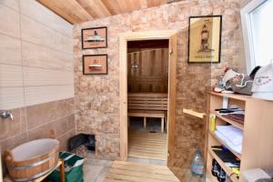 a small room with a stone wall and a door at Apartments in a "VILLA VISTA JAVEA" in Jávea