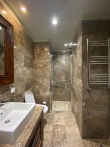 Ett badrum på Ultra Luxury Residence