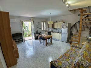 Kuchyň nebo kuchyňský kout v ubytování Casa Vacanza AcquaMarina + 37 fotografií
