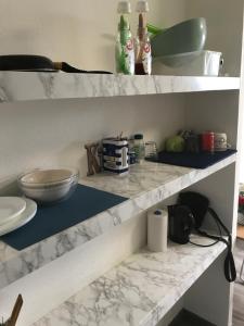 Kuchyň nebo kuchyňský kout v ubytování Coquet Studio PROCHE CENTRE + 19 fotografií