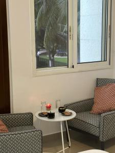 Ruang duduk di Guided Hospitality - Luxury Accommodations