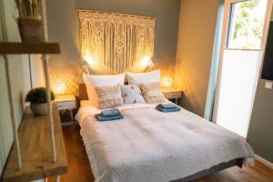Voodi või voodid majutusasutuse LITELIVING Familiensuite BoHo toas