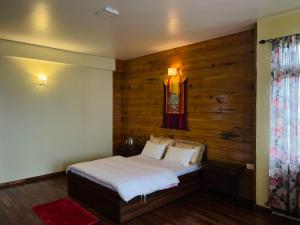 Una cama o camas en una habitación de Martam Farmhouse