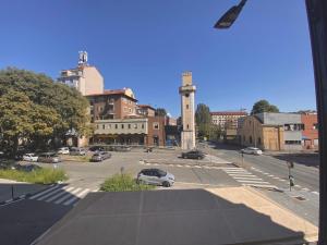 a view of a parking lot in a city at Nido dei Cigni in Turin