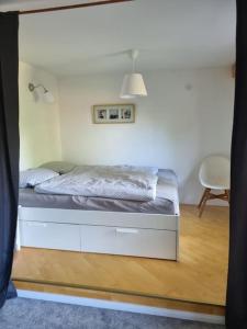 Posteľ alebo postele v izbe v ubytovaní Einmal Auftanken bitte... Kiel...direkt am See..