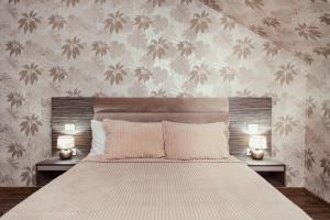 Katil atau katil-katil dalam bilik di Poiana Verde Garden House