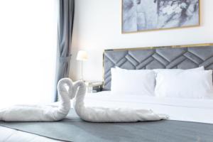 Posteľ alebo postele v izbe v ubytovaní JBR apartments by HAPPY SEASON