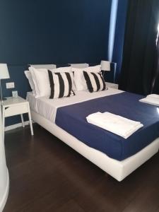 A bed or beds in a room at I DIOSCURI