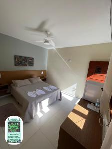 Postel nebo postele na pokoji v ubytování Pousada Cristhal Paraty