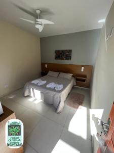 Postel nebo postele na pokoji v ubytování Pousada Cristhal Paraty