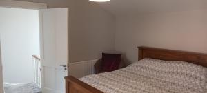 Ліжко або ліжка в номері Eglinton Road - Super King - Ensuite