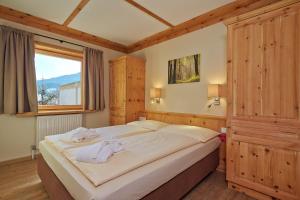 Das Hopfgarten Aparthotel客房内的一张或多张床位