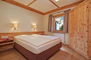 Das Hopfgarten Aparthotel客房内的一张或多张床位