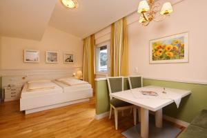 Das Hopfgarten Aparthotel客房内的一张或多张床位