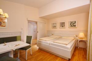 Das Hopfgarten Aparthotel客房内的一张或多张床位