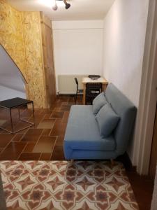 Posezení v ubytování Le souplex d'Anaïs