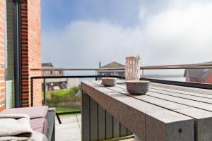 Balkón nebo terasa v ubytování Auf der Ostsee - am Meer - Olpenitz - by Unsere Urlaubszeit