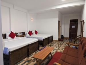 Postel nebo postele na pokoji v ubytování Nilowin Glenanore Guesthouse