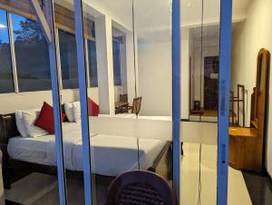 Postel nebo postele na pokoji v ubytování Nilowin Glenanore Guesthouse