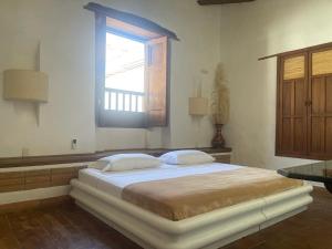 Katil atau katil-katil dalam bilik di Casa Real Amanvari