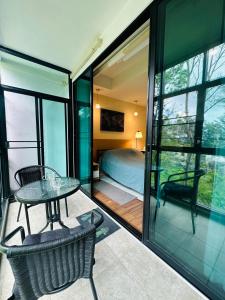 Et tv og/eller underholdning på Brand Naithon Condo C411