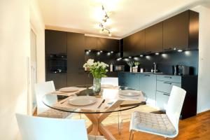 Kuchyň nebo kuchyňský kout v ubytování VOYAGE Stadtoase am Fluss I Zentral I freier Parkplatz I Wifi I Netflix I Aufzug