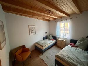 Ένα ή περισσότερα κρεβάτια σε δωμάτιο στο Ferienhaus am Beverinsee