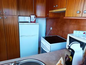 Kuchyňa alebo kuchynka v ubytovaní NOG - La Nogalera, 2 dorm, 2 baños, Terraza, Piscina, Wifi