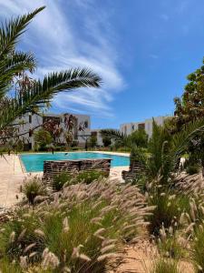 Bassein majutusasutuses Luxurious Golf & Sea View Beach Apartment with Pool Access - Tamourrit, Taghazout Bay või selle lähedal