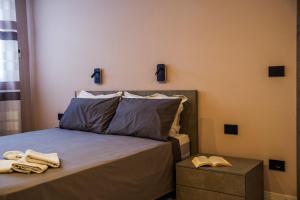 Postel nebo postele na pokoji v ubytování Vista Langhe - CerratoHouses