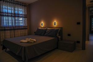 Postel nebo postele na pokoji v ubytování Vista Langhe - CerratoHouses